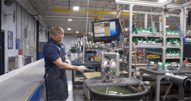 Versamatic Employee Preparing an AODD Pump for Use